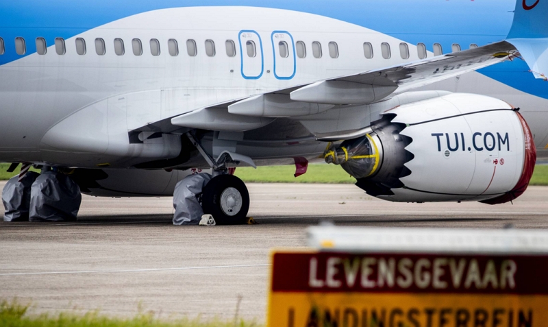 荷兰各航空公司对新措施不满，表示将不强制要求乘客戴口罩