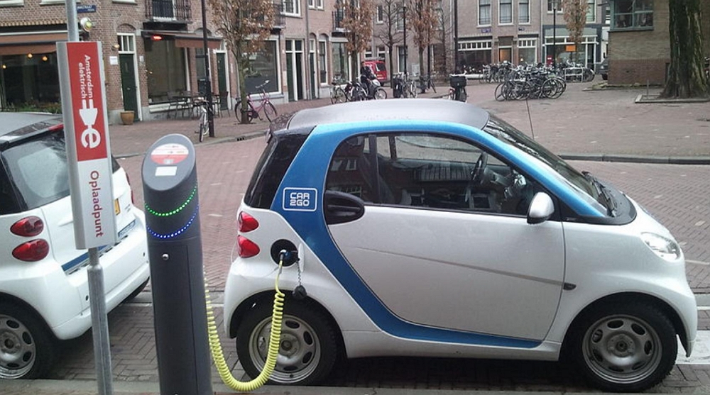 荷兰电动汽车需求剧增，哪个城市占比最高？哪个城市最低？